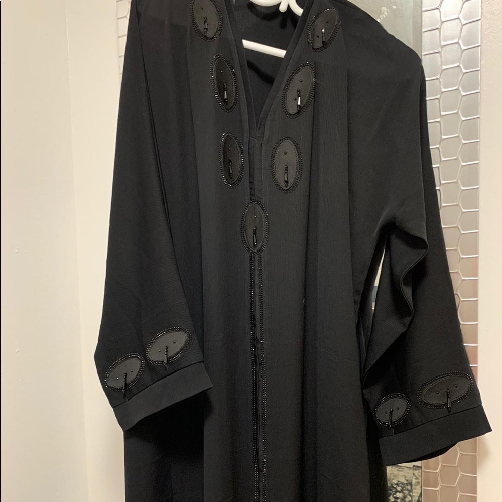It's a New abaya the colour is black.